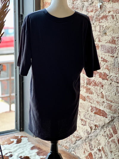 The backside of the black Brewer Boot-Stitch Graphic Tee Dress on a mannequin.