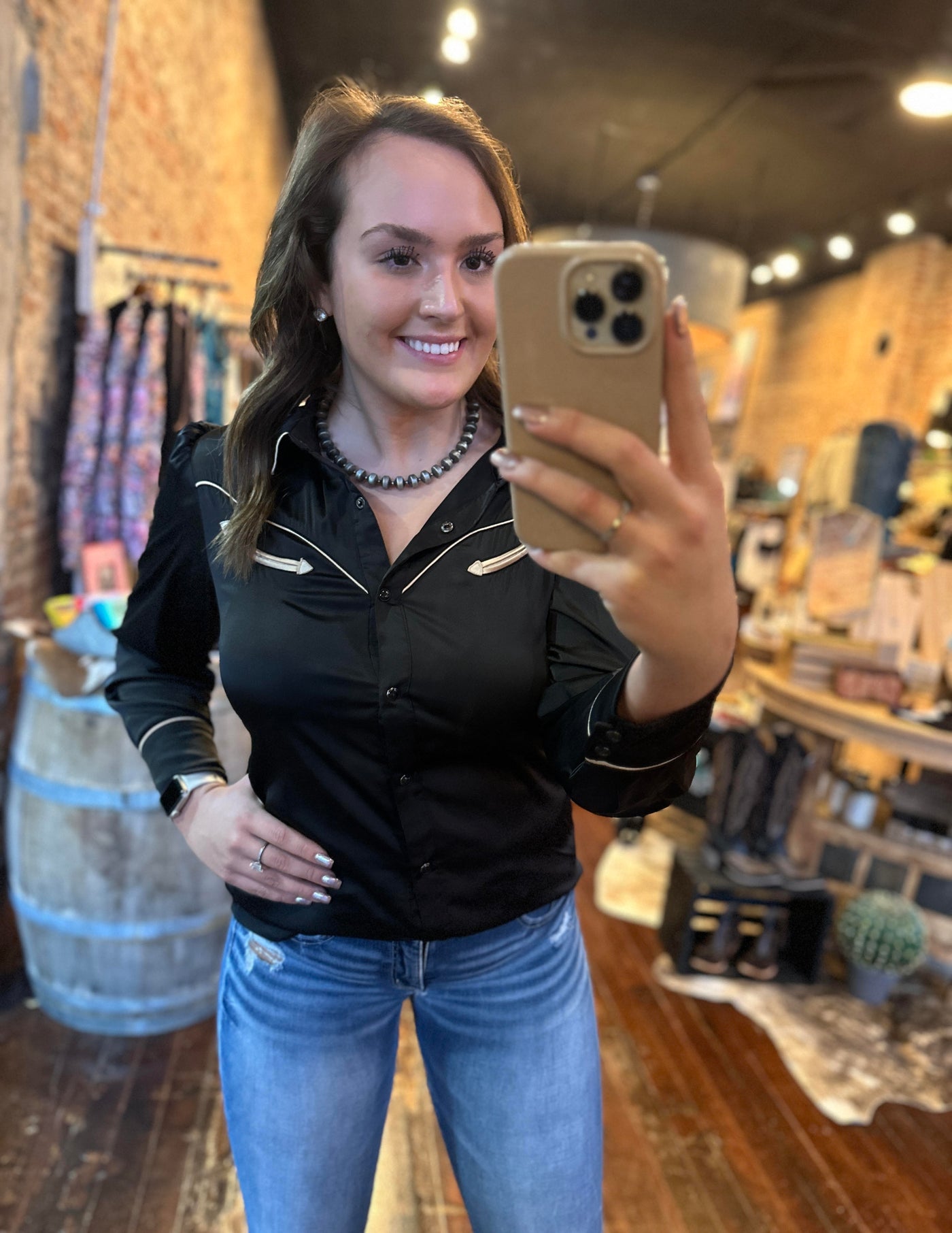 The Archie Black Western Yolk Pearl Snap modeled by a Broker Leather Employee.