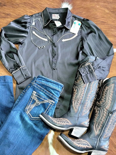 An NFR Fashion Outfit for women featuring the Black Ariat Casanova Boots and the Archie Black Western Yolk Pearl Snap.