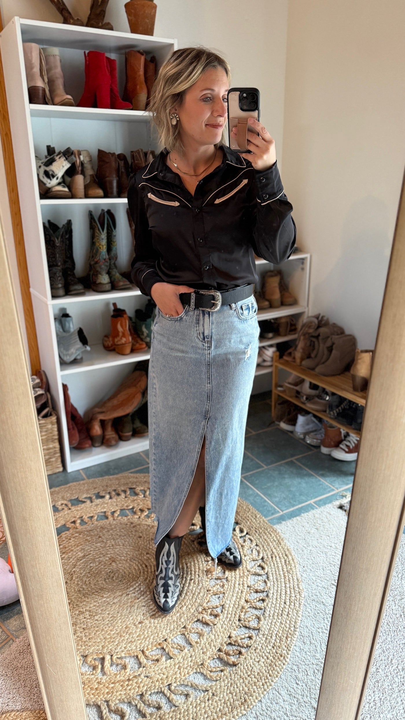 The Archie Black Western Yolk Pearl Snap paired with a denim skirt is a prime example of Broker Leather's Western NFR Style.