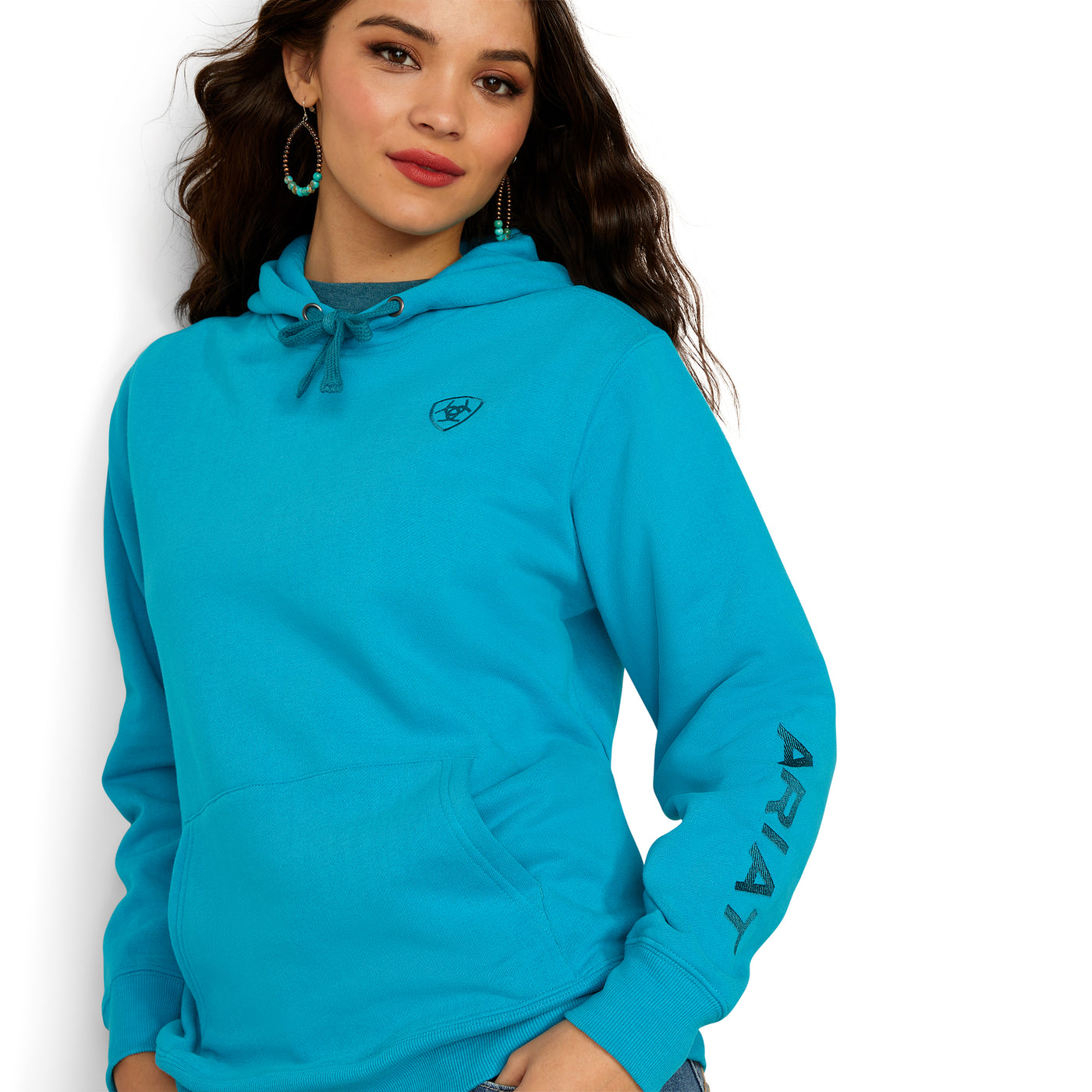 Stock photo of woman modeling the Ariat Logo 2.0 Hoodie [Capri Breeze].