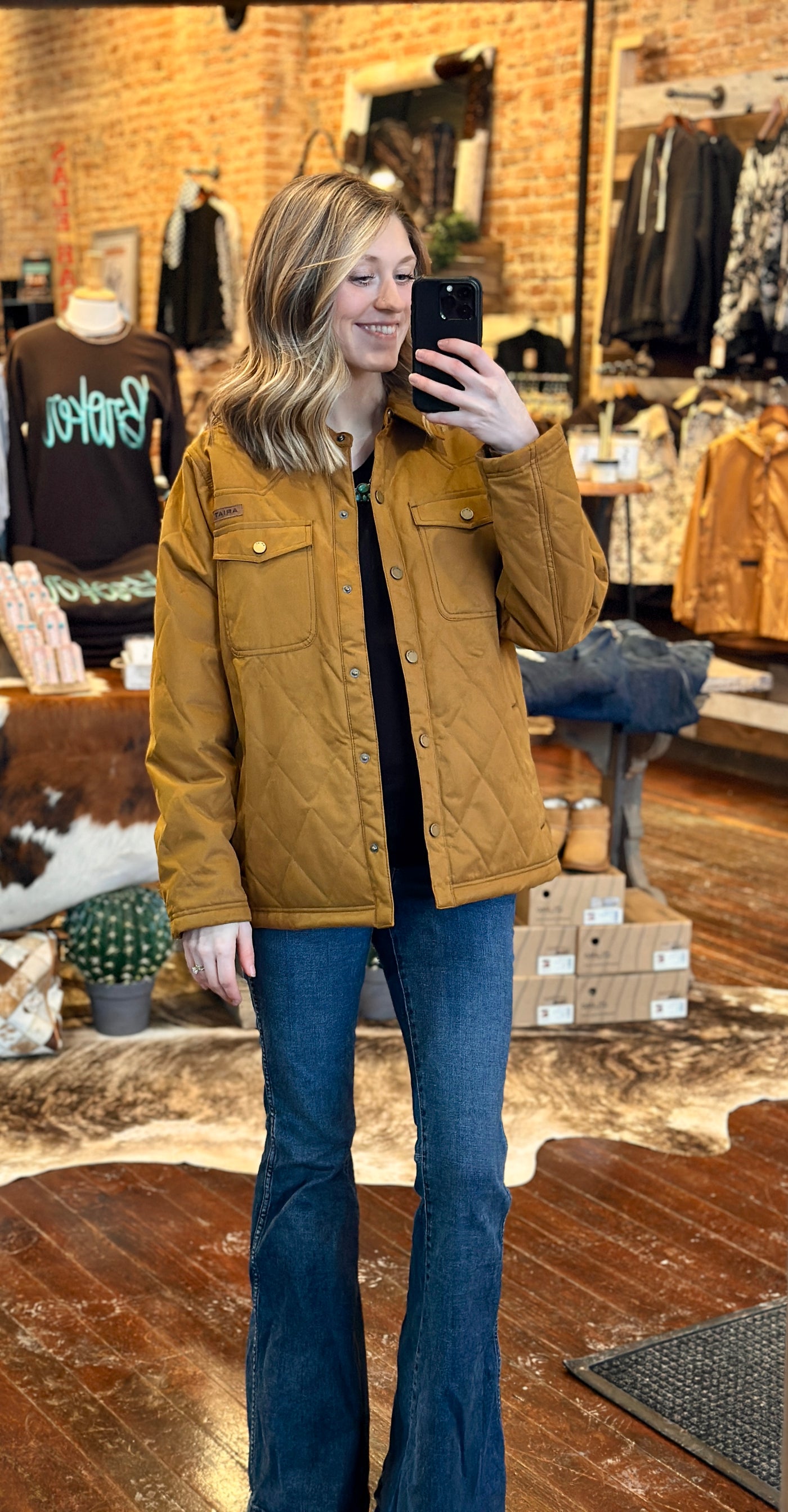 Pair the Ariat Grizzly Barn Jacket with your favorite boots for a look that’s as practical as it is effortlessly Western like our model did here.