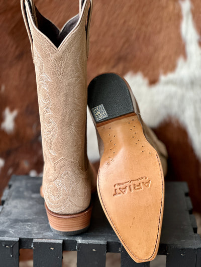 Sole view of the Ariat Hazen Snip Toe Boot, displaying its luxurious suede texture, classic silhouette, and leather bottom, perfect for dancing.