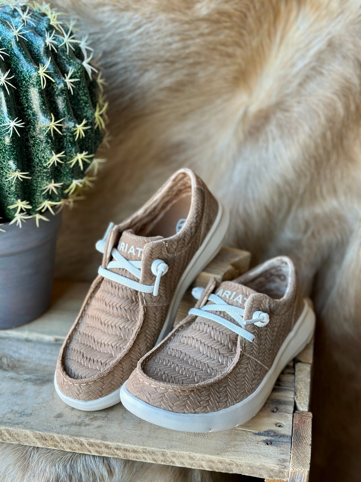 Ariat Hilo Slip-On Shoe in Tan Woven Emboss with a stylish, textured design for a comfortable and casual look.