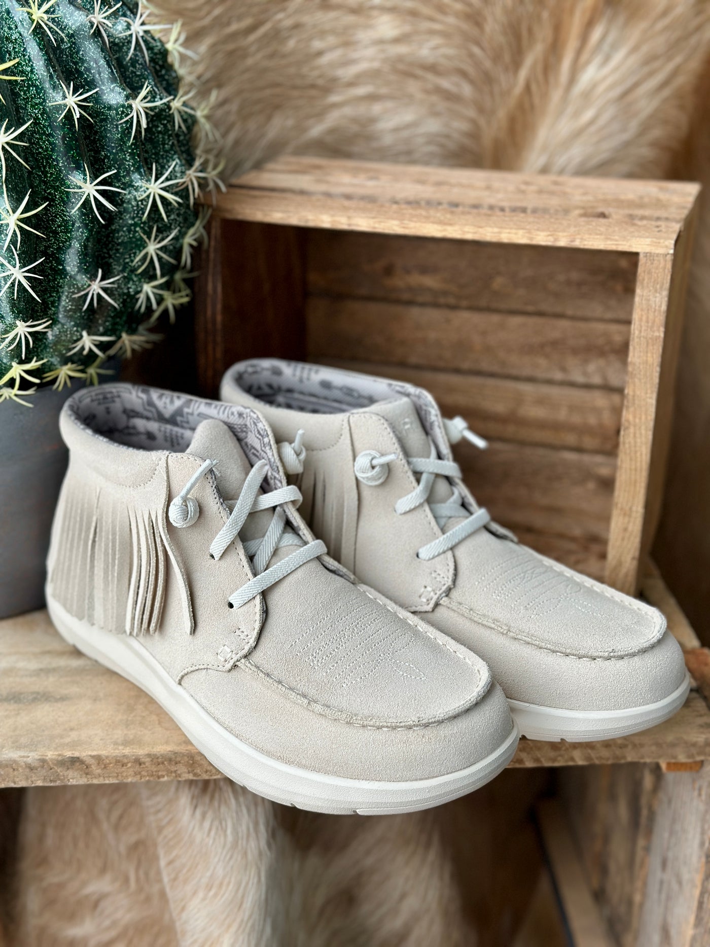 Profile picture of Ariat Hilo High Top in Sand Suede showing fringe detail for casual western outfits.