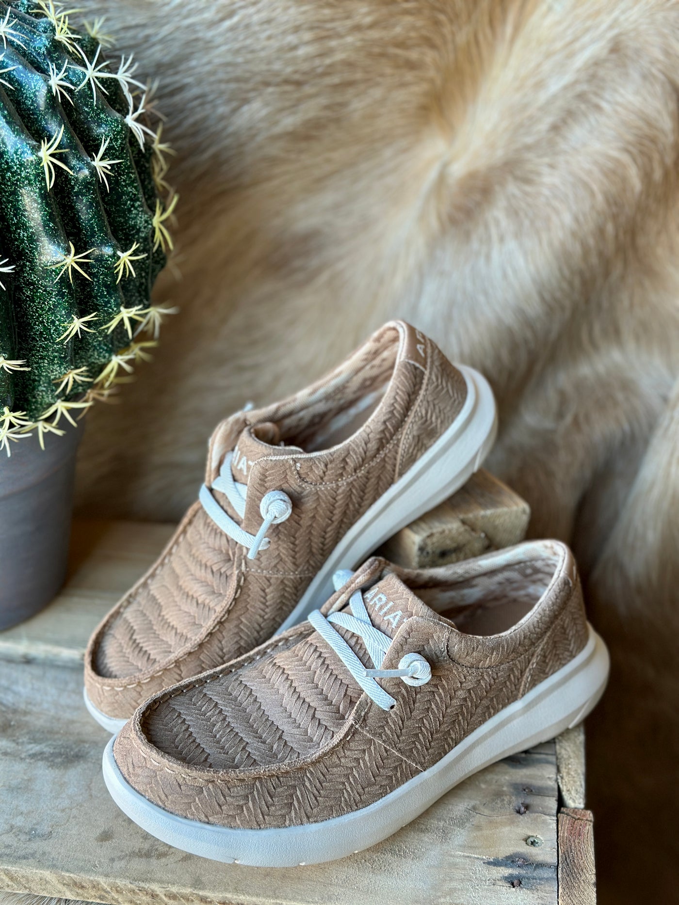 Tan Woven Emboss Ariat Hilo Slip-On Shoe features a slip-on design for easy wear and a modern, versatile style.