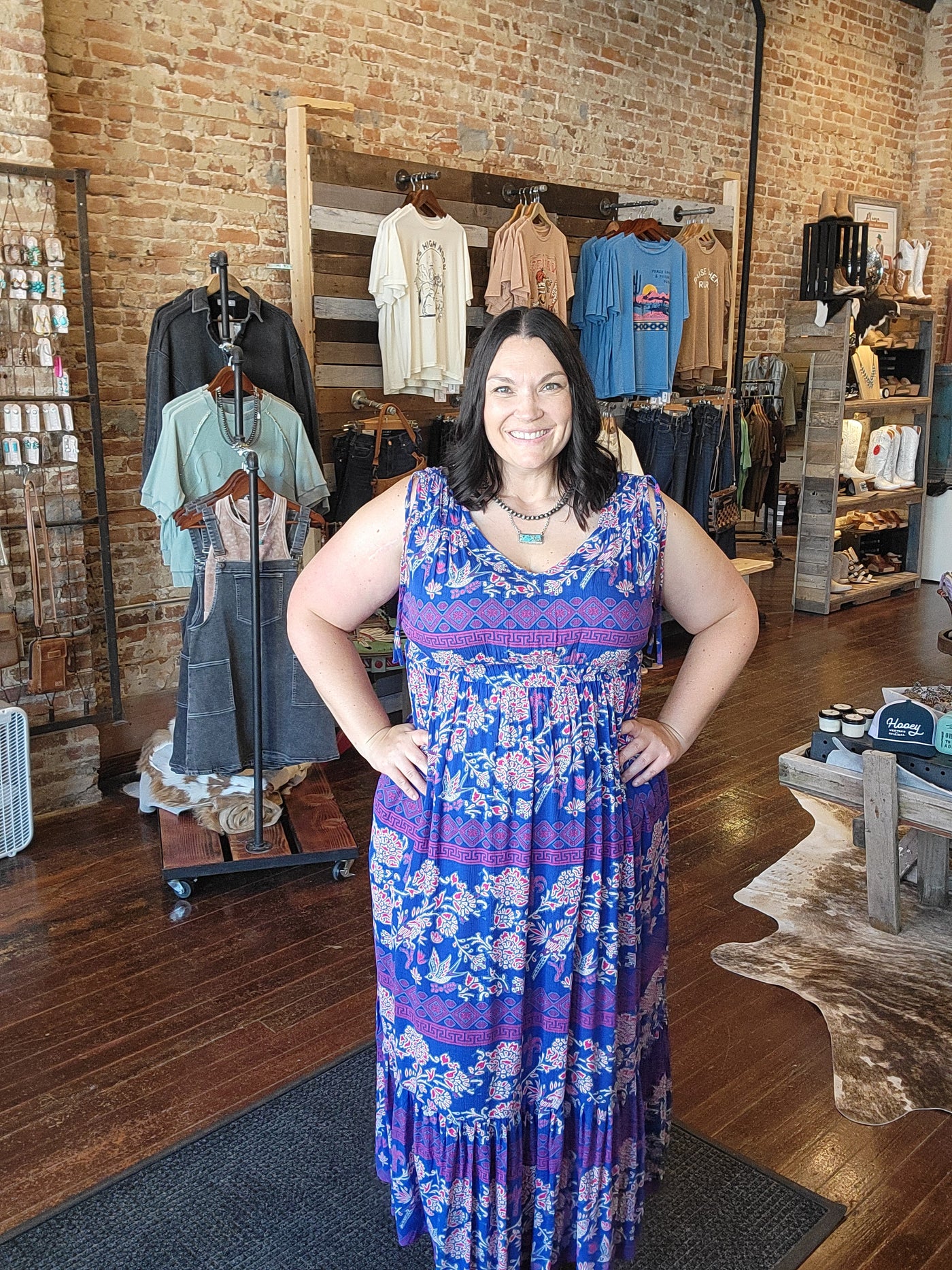 Printed rayon crinkle crepe in Barbie pink and bright royal blue make this Ariat Westley Candelia Print Dress a perfect statement piece.