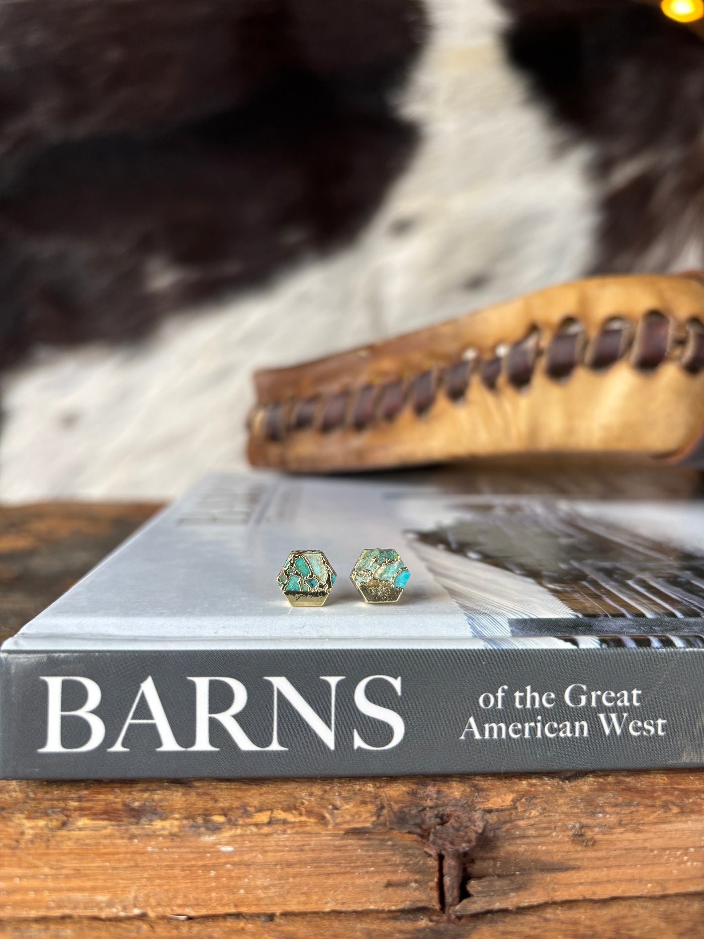 Tiny turquoise and gold earrings with unique stone variation and ethical craftsmanship