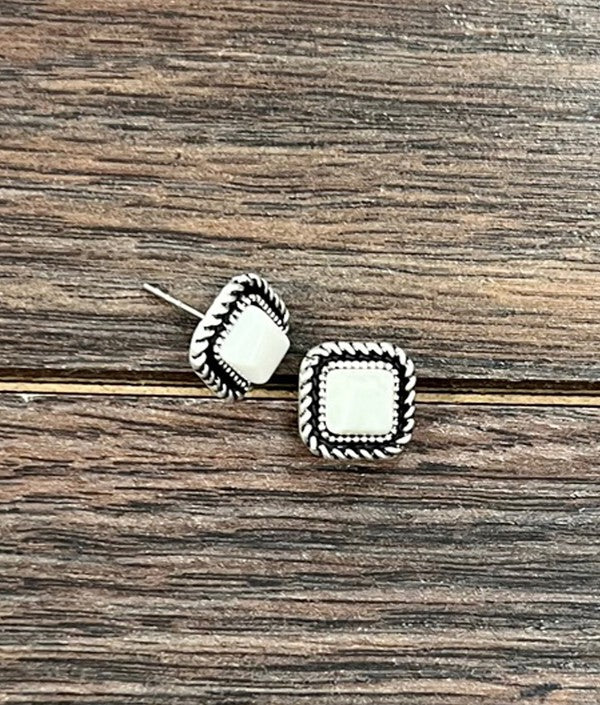 Side view of Bowie White Buffalo Stud Earrings showing their lightweight, post-back style.