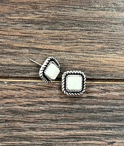 Side view of Bowie White Buffalo Stud Earrings showing their lightweight, post-back style.