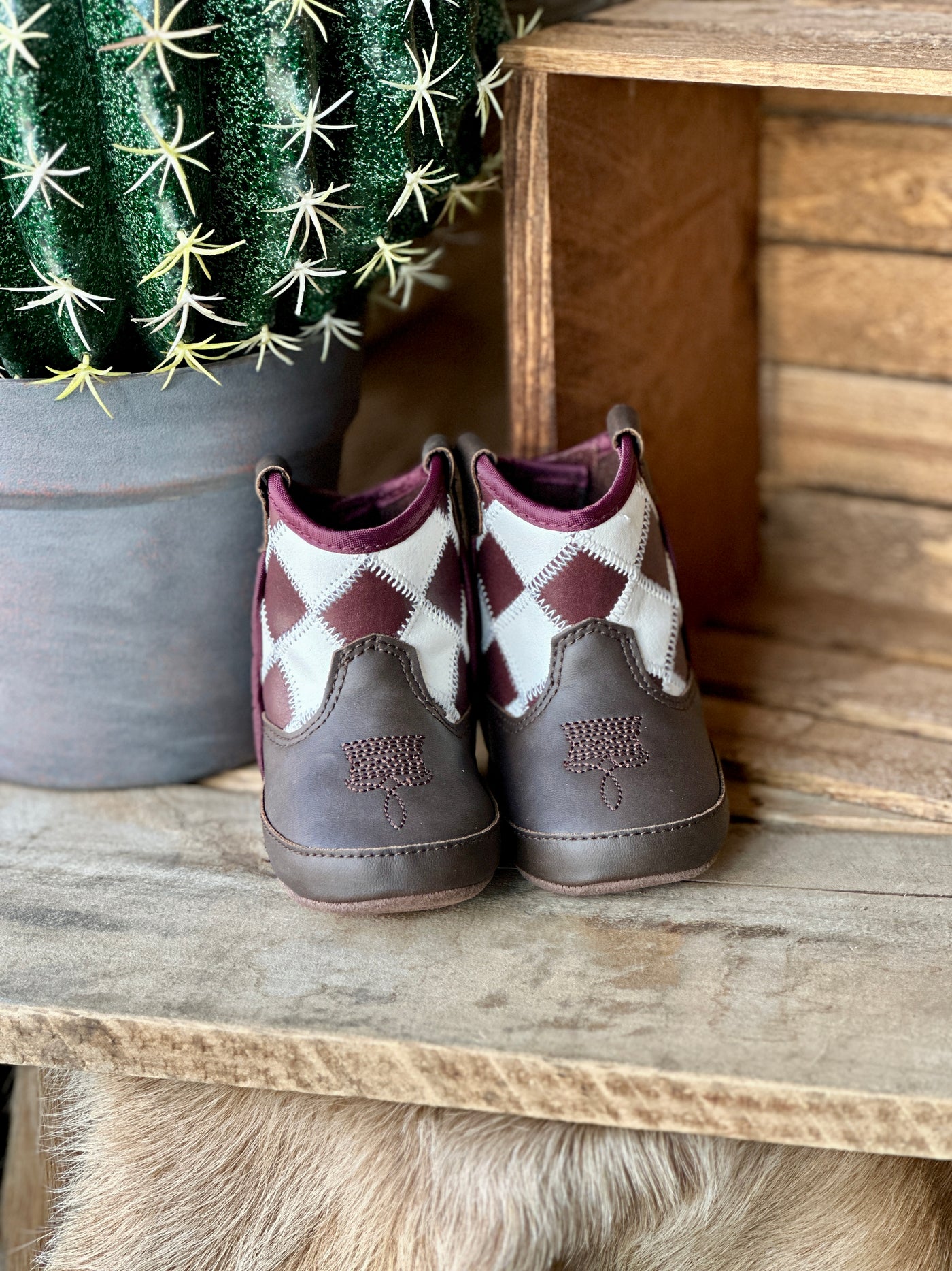 Brown and White Checkered Baby Cowboy Boots with Classic Western Style.