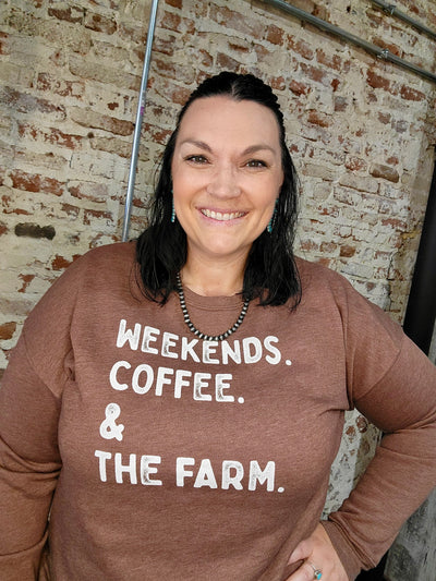 100% ring-spun cotton crewneck in warm chocolate brown modeled by Broker Leather employee, Sam.