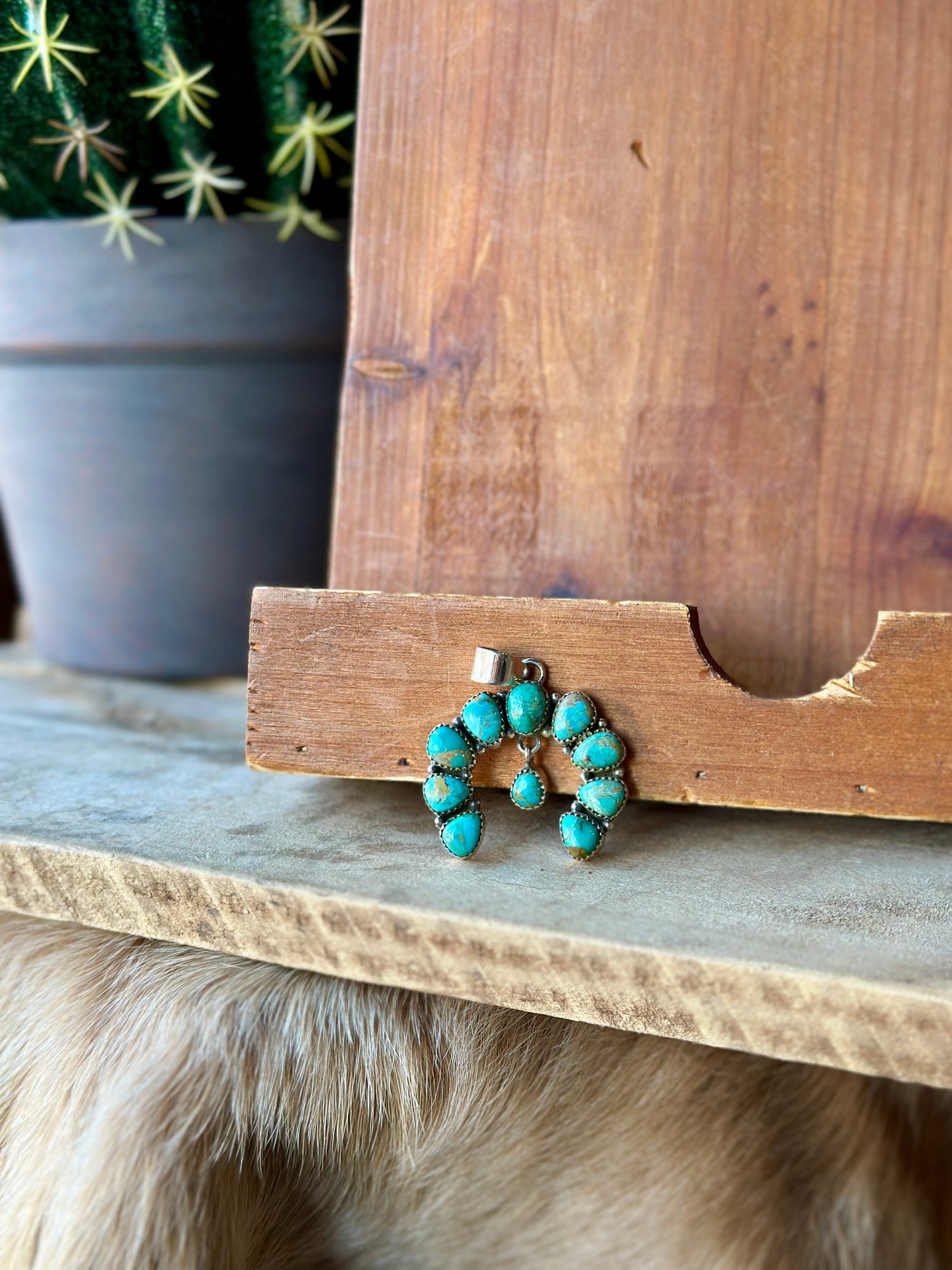 Briar Authentic Turquoise Naja Pendant with a beautiful, bold turquoise stone and vintage Western charm for the modern cowgirl.