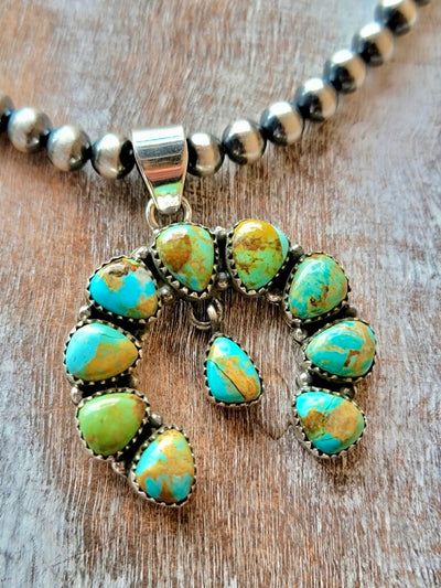 Close-up of Briar Naja Pendant Showcasing Authentic Kingman Turquoise