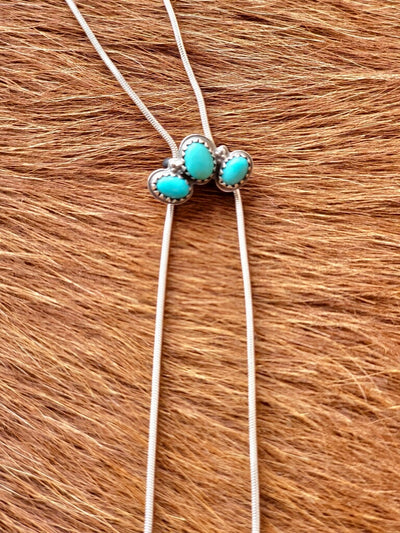 Solid Sterling Silver & Authentic Turquoise Bolo Necklace with Unique Half Cluster Setting