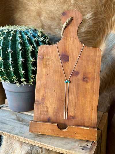 Calvin Authentic Turquoise Half Cluster Bolo Necklace featuring three vibrant turquoise gemstones set in sterling silver, adjustable snake chain.