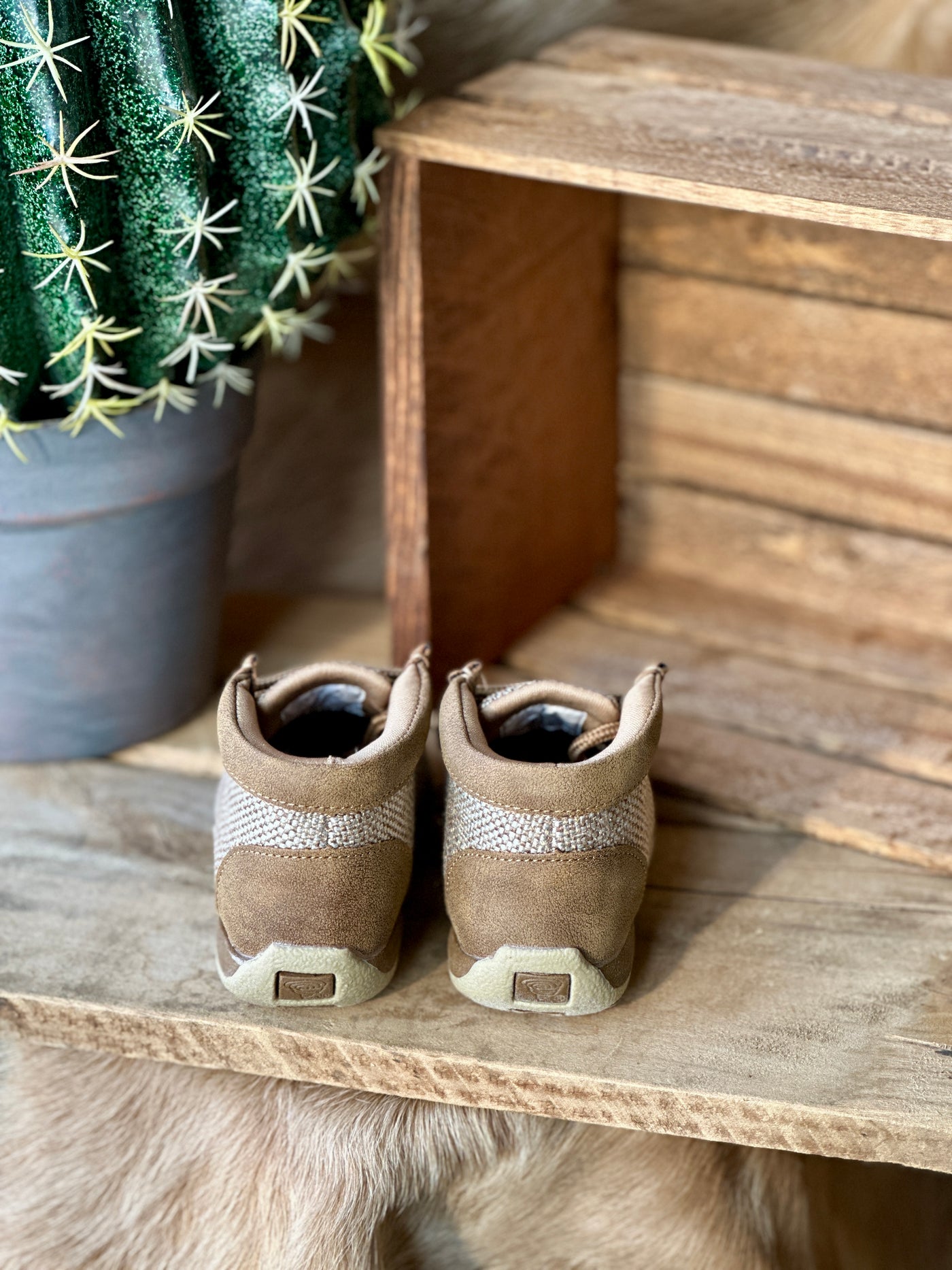 Brown tweed toddler boots with traction-enhancing TPR outsole.