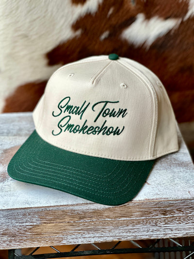 Flat lay of the Cassandra Small Town Smokeshow Cap, showing its curved brim and durable polyester-cotton blend.