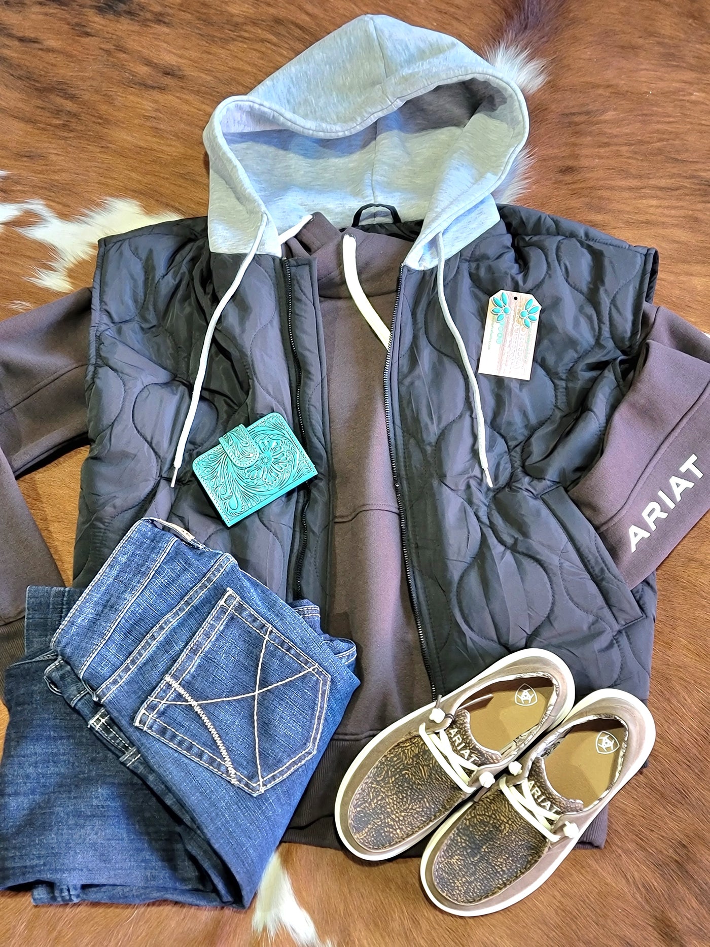 Flatlay photo of an outfit featuring our Celebrity Shot Quilted Vest [Black].