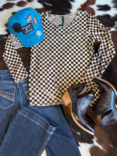 A flatlay photo of outfit inspiration featuring the Championship Long Sleeve Velvet & Mesh Top & Ariat Dixon Booties.