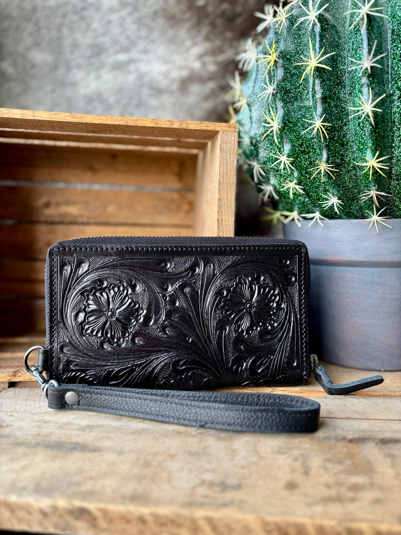 Close-up of the tooled leather design on the Cholula Wallet, showcasing detailed craftsmanship.