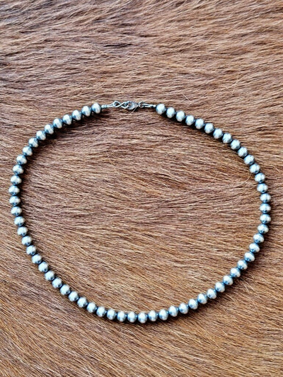 Handcrafted 16-inch Navajo Pearl Necklace with heirloom-quality sterling silver beads.