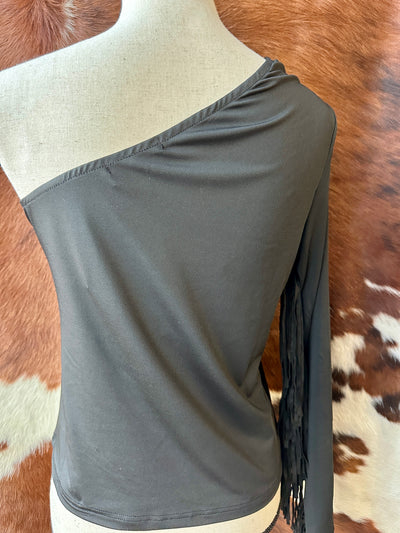 Asymmetrical neckline and dynamic fringe design on the Conway top, a must-have for modern cowgirl style.