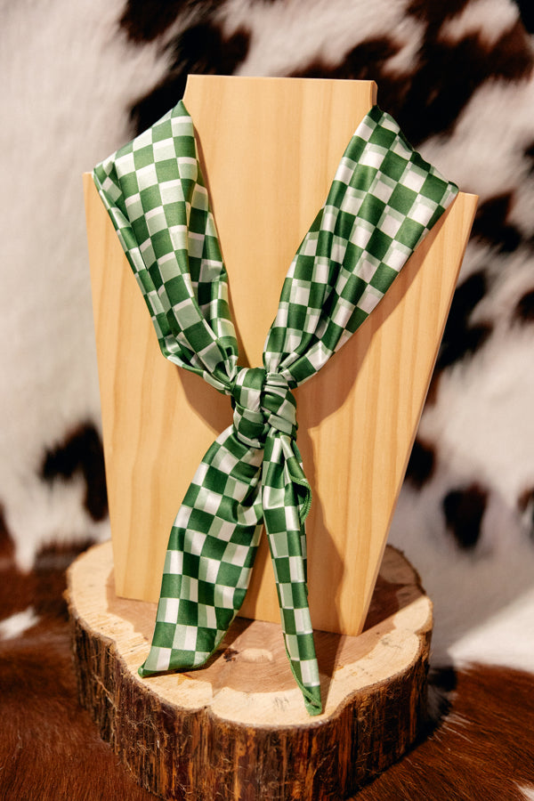 Green and white checkered wild rag suitable for wearing as a neckerchief, scarf, or headband.