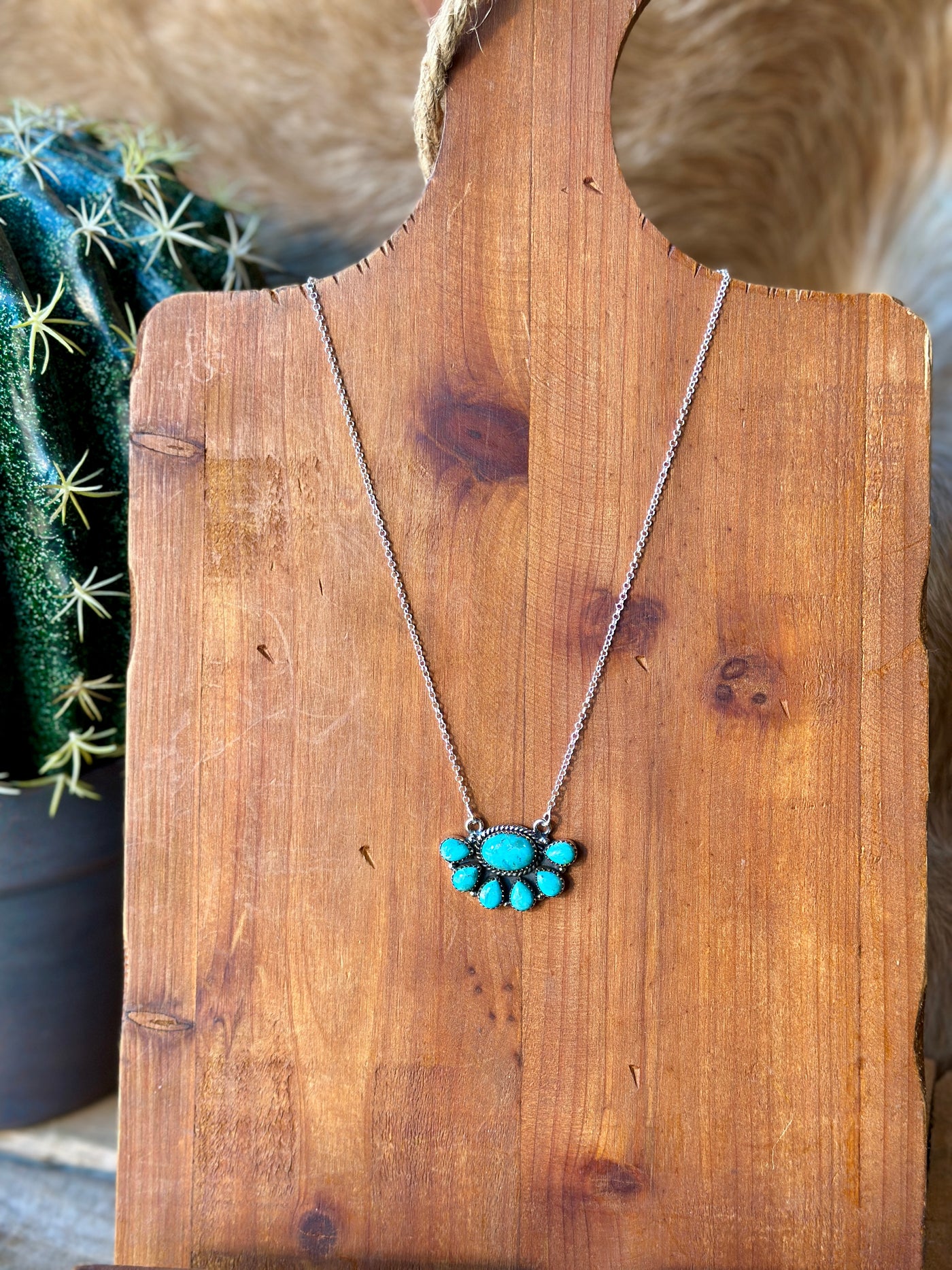 Cunningham Authentic Turquoise Half Cluster Necklace with one-of-a-kind Kingman turquoise stones set in sterling silver.