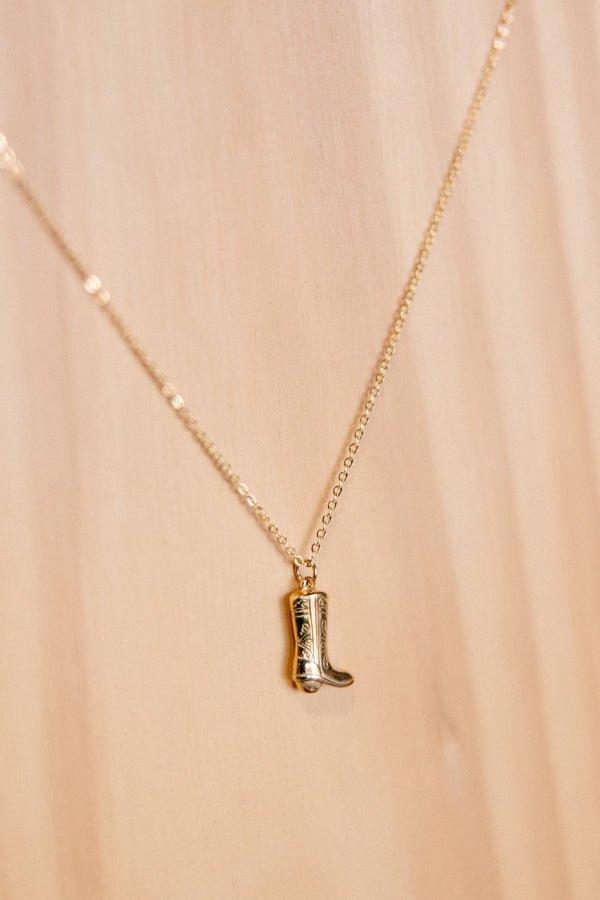 Downtown Waukon, Iowa, Broker Leather Boutique offers this Damian Gold Cowboy Boot Necklace.