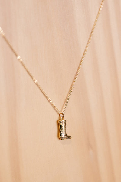 Downtown Waukon, Iowa, Broker Leather Boutique offers this Damian Gold Cowboy Boot Necklace.