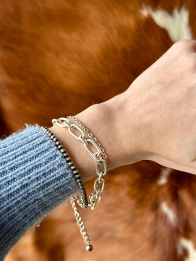 Close-up of Diane Navajo Pearl Chain Link Bracelet showcasing its adjustable fit and elegant blend of tradition and trend.