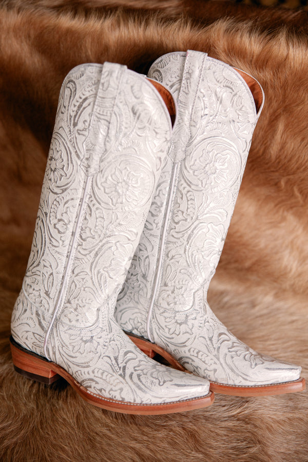 Flat lay of Dingo Bellona White & Silver Embossed Boots featuring detailed floral patterns and Western-style craftsmanship.