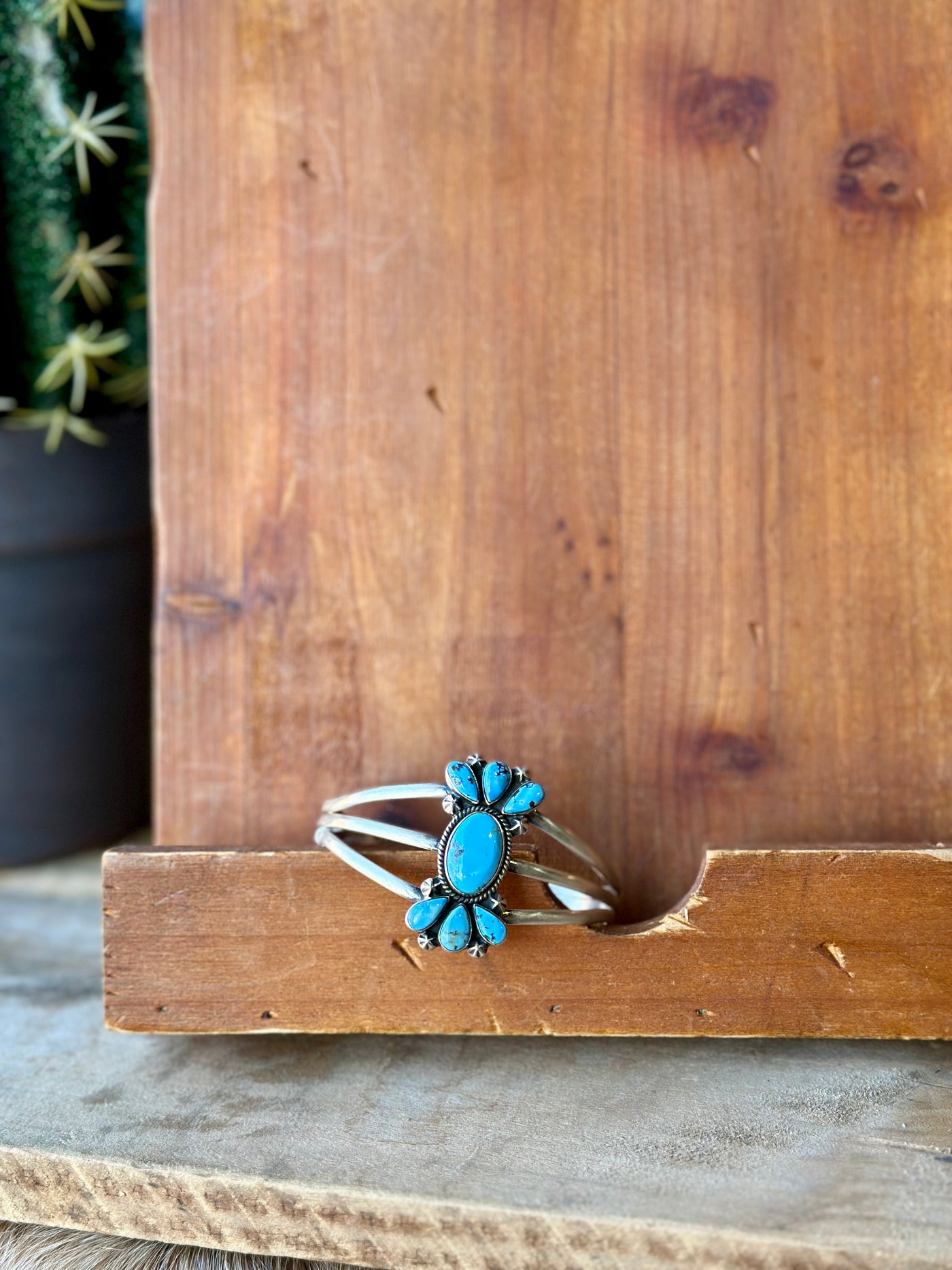 Durango Authentic Turquoise Cuff Bracelet featuring vibrant turquoise stones set in a sleek sterling silver cuff design.