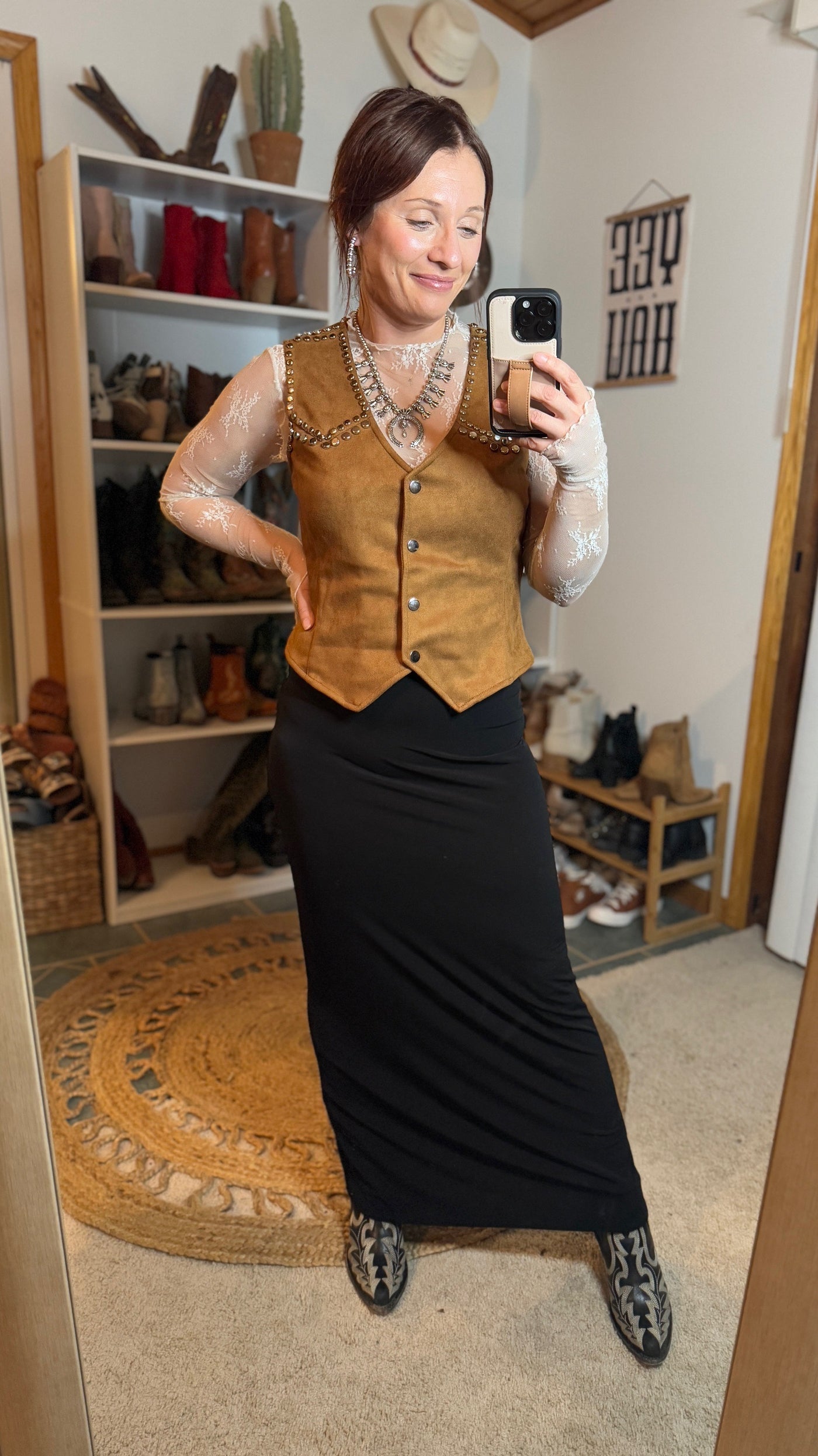 Dust Devil Suede Studded Vest on western outfit by Broker Leather model.