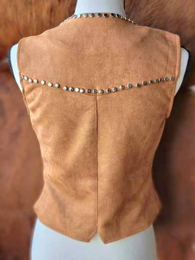 Detail of the studded embellishments on the backside of the Dust Devil Suede Vest, emphasizing its luxurious and edgy design.