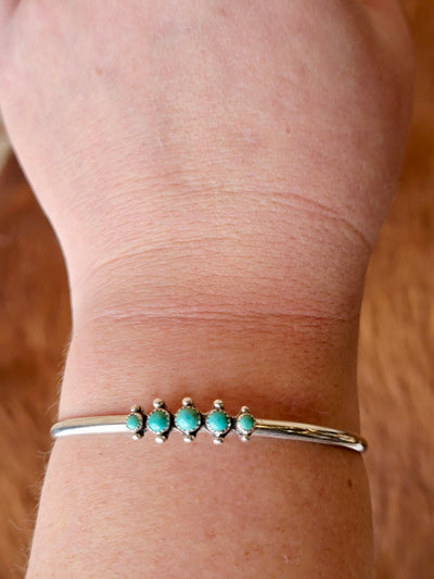 Close-up of Turquoise Stacking Cuff Bracelet on Wrist.