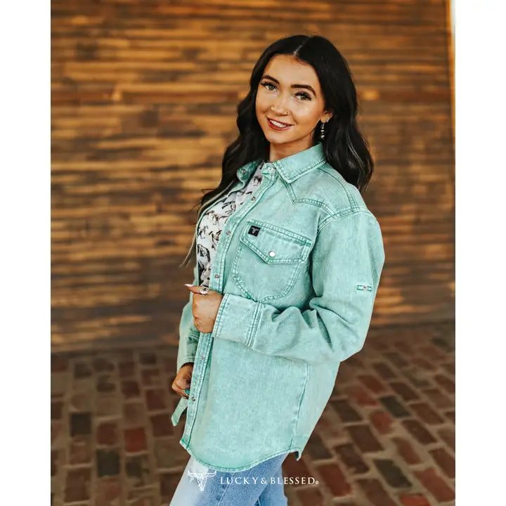 Jade Mineral Wash Denim Shirt with Chest Pockets layered over a long sleeve mesh with denim jeans.