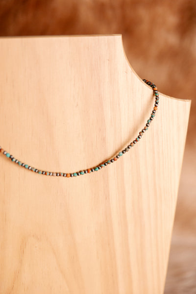 Close-up of Erin Navajo Pearl & Turquoise Gemstone Necklace showcasing natural-looking turquoise stones and Navajo pearls.