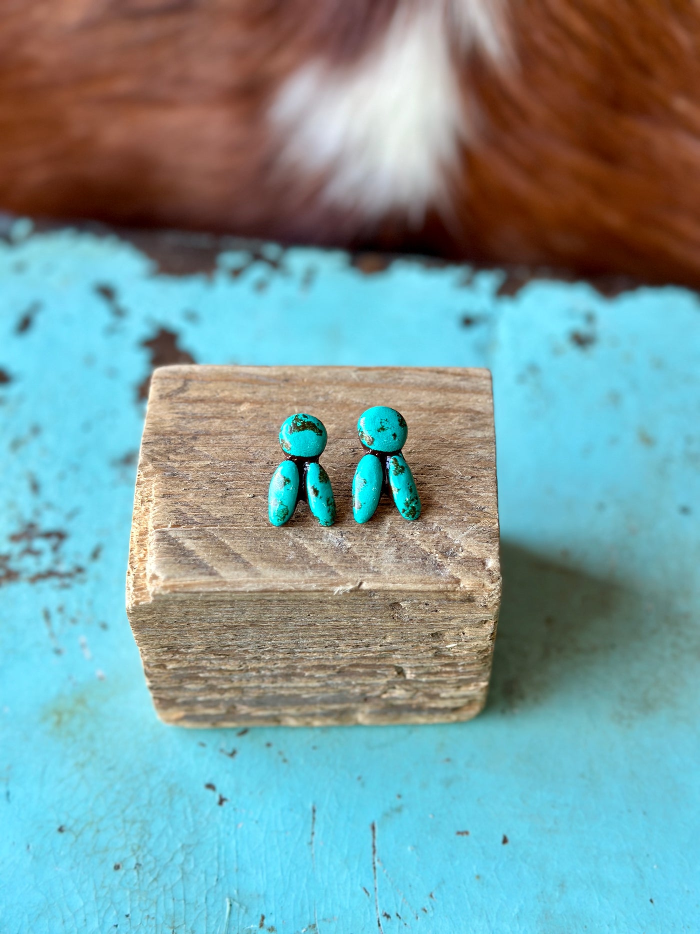 Detailed shot of Euchre Turquoise Clay Stud Earrings showing the textured clay and turquoise-inspired finish.