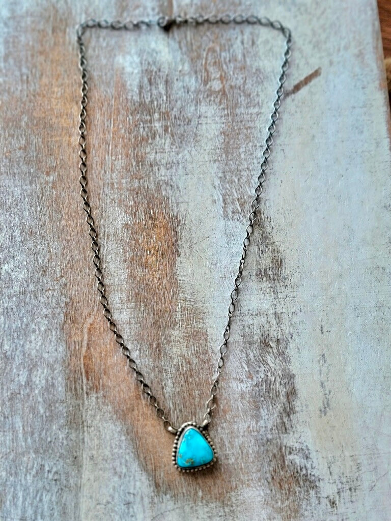 Lightweight and elegant turquoise pendant necklace for layering.