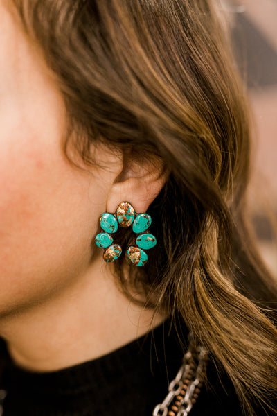 Fannie Turquoise Clay Cluster Earrings styled with a Western outfit, adding a statement pop of turquoise-inspired color.