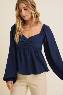 Fearless Babydoll Blouse perfect for concerts or elegant casual wear.