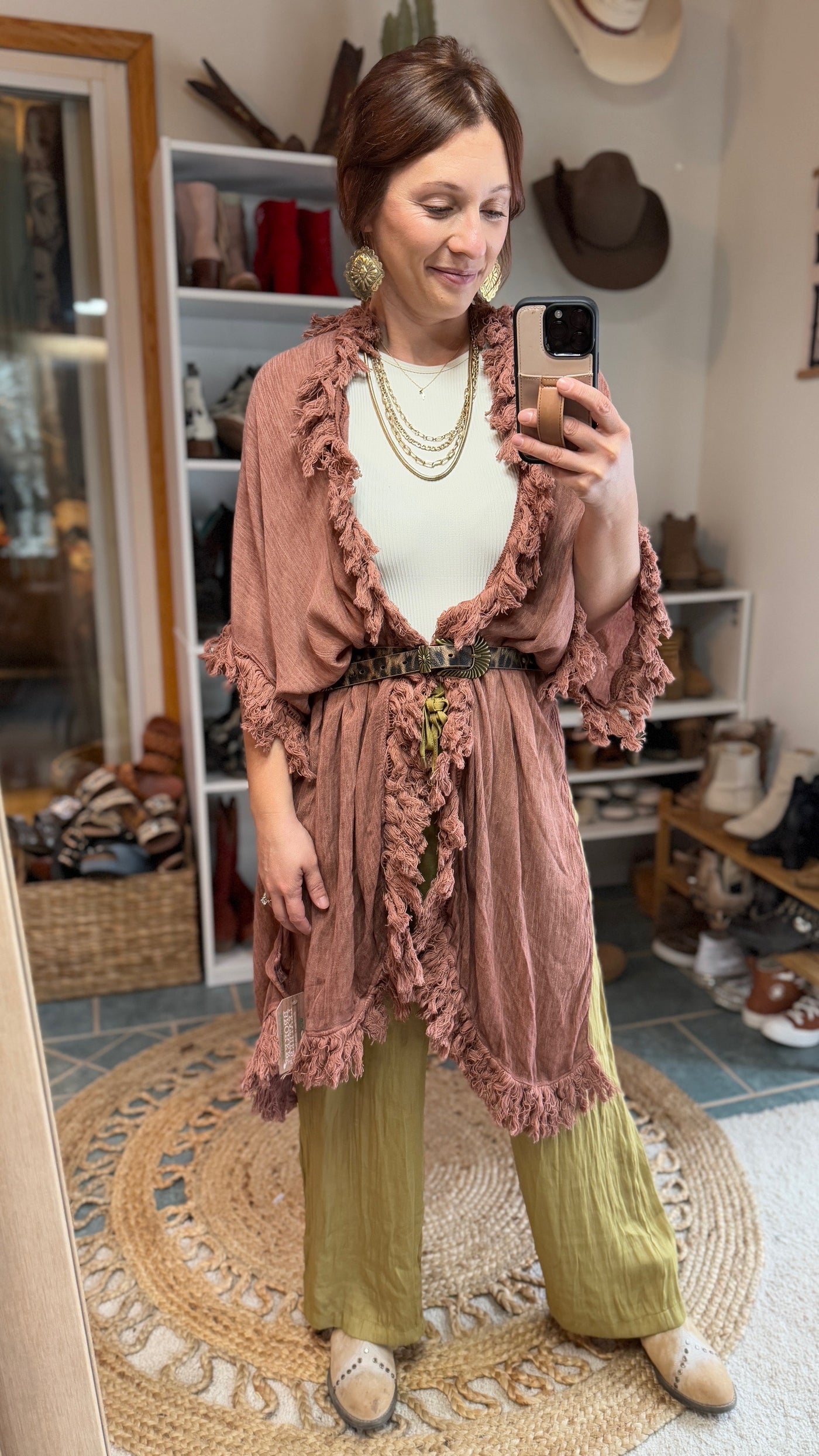 Forty Years Fringe Kimono with lightweight sun-bleached fabric for a boho-chic look paired with gold accessories on Broker Leather model.