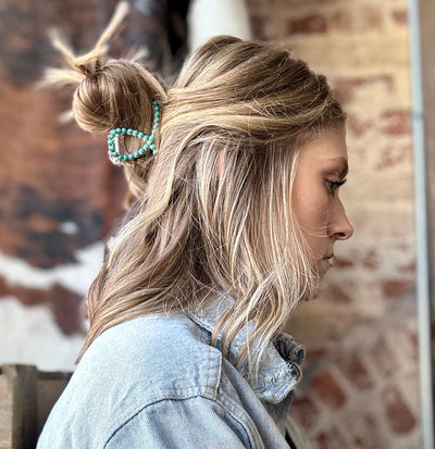 Woman modeling our Hudson Small Turquoise Bead Hair Claw Clip in her hair.