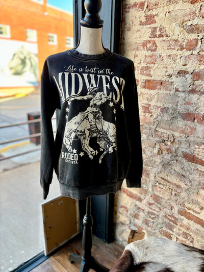 Front side view of our Ria Midwest Rodeo Crewneck [Black & White] on a mannequin.