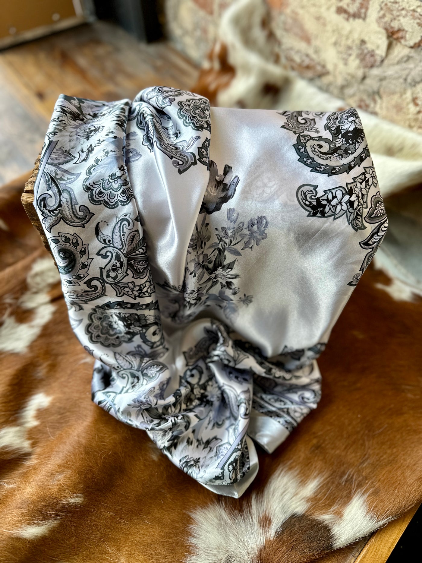 Flatlay photo of our Weston White & Silver Floral Wild Rag.