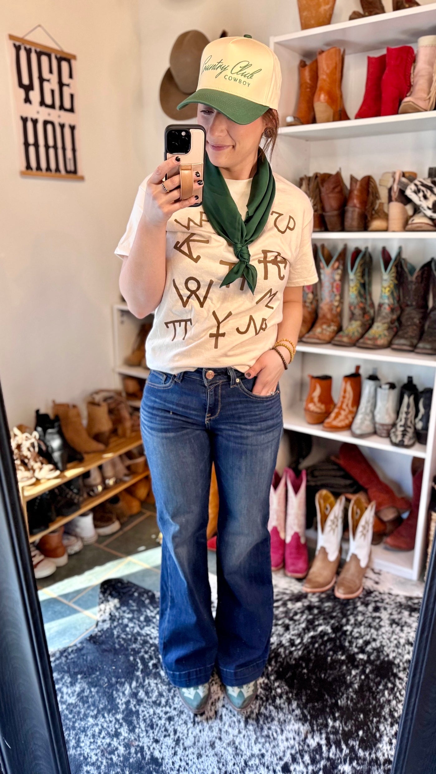 Gina Western Brand Tee with rustic brown cattle brand graphic on cream cotton fabric.