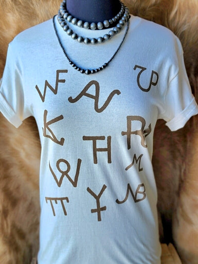 Gina Western Brand Tee with rustic brown cattle brand graphic on cream cotton fabric.