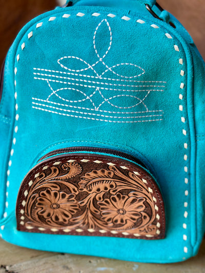 Close-Up of Boot Stitch Pattern on Suede Leather Backpack.